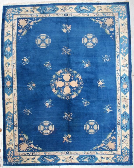 #7165 Peking Chinese Rug

This Peking Chinese rug measures 9’2” X 11’8”. It has a medium blue field with a central medallion of four flowering urns coming together to form a wreath with  ...