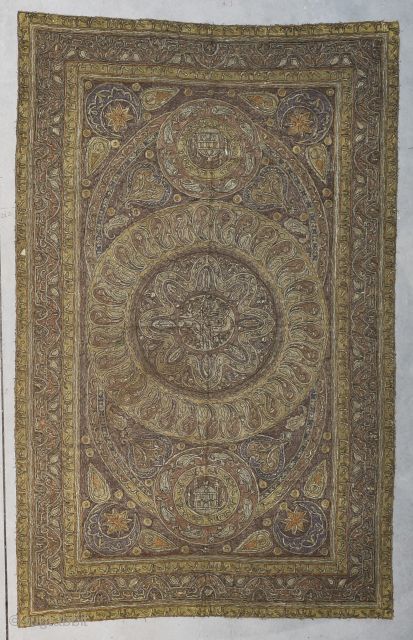 This Ottoman  tapestry bears the Tugra of Mustafa IV and dates from 1807-1808. It measures 4’6” x 7’1”. It has metal embroidery. It has Islamic writing and motifs such as Mosques  ...