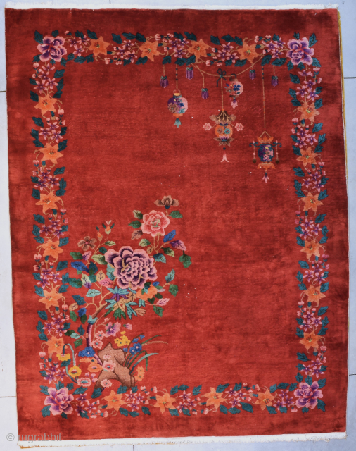 This circa 1925 Art Deco Chinese Oriental rug #8213 measures 9‘ 0“ by 11‘6“. This is a beautifully designed deco. The red field has a floral border consisting of orchids at every  ...