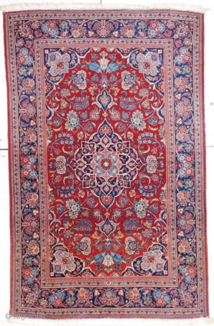 http://antiqueorientalrugs.com/persian4.htm This circa 1930 European quality Kashan measures 4’4” X 6’9”. It has a pulled floral medallion on a tomato red ground with fleur de lis in the corners in sky blue  ...