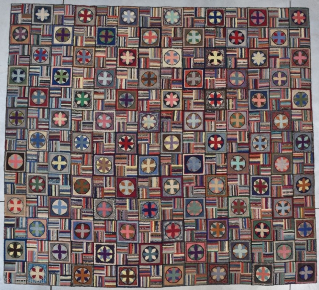 This Antique American Hooked Rug #8076handmade in 1928 measures 9’7” X 10’8”. The motif is 182 separate squares laid out in rows of 13 x 14 squares with millions of different designs  ...