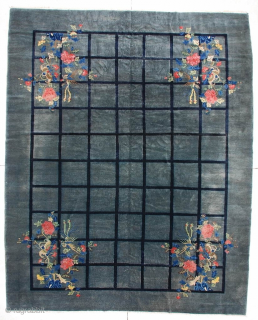 #6111 Antique Peking Chinese Rug 

This circa 1910 Antique Peking Chinese rug measures 9’3” X 11’7”. It has a fantastic design of a riot of flowers in each of the four corners  ...