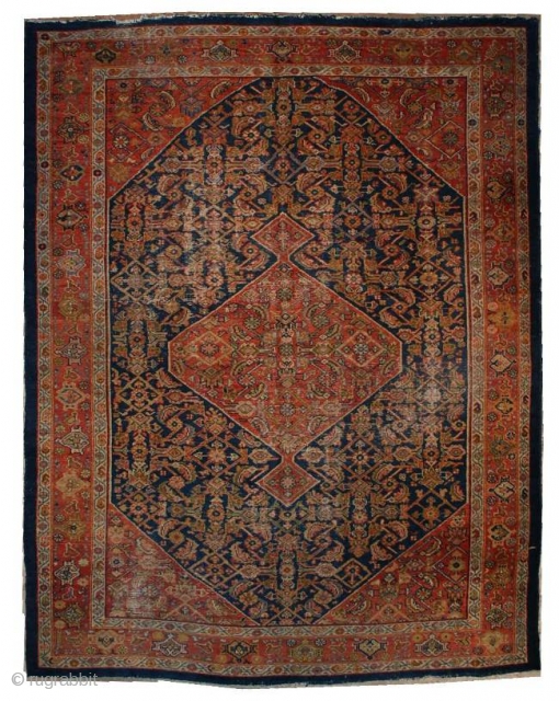 
#6566 Mahal Antique Persian Rug
This circa 1910 Mahal antique Persian Oriental Carpet measures 8’3” X 10’7”. It has a pulled medallion in rust on a dark blue field with Herati design. The  ...