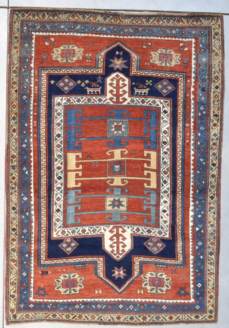 This third quarter 19th century Kazak rug #8201 measures 4‘8“ by 6‘8“. This is the most beautiful Kazak ever seen. It is really lovely. Words cannot do it justice. It’s complete. It  ...