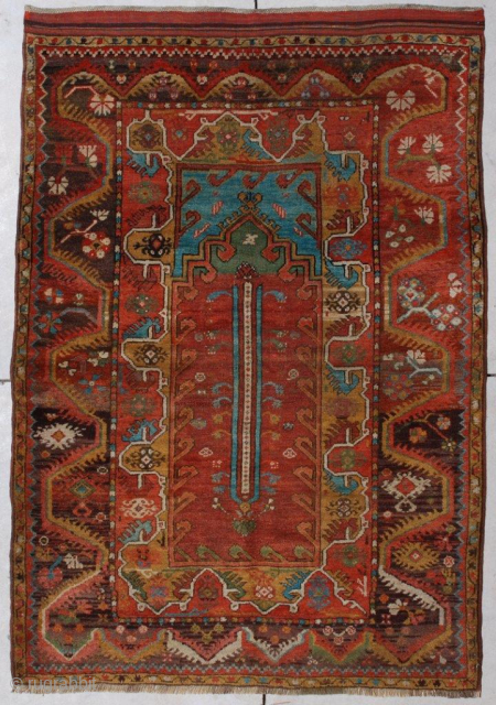 #6787 Antique Turkish Melez Rug 3’11 X 5’7″

 This circa 1875 Melez or Melas Oriental carpet measures 3 ‘11” x 5’ 7”. The prayer niche is in medium green.  The spandrels  ...