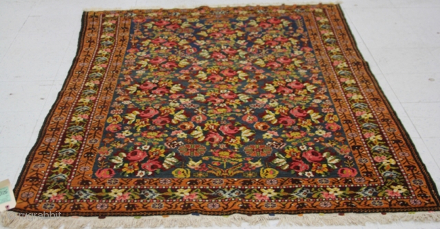 CAUCASIAN KARABAKH RUG:

Dimensions- 4' 7" x 6' 8"                         