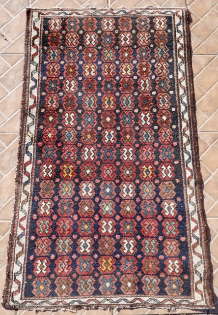 Small Bakhtiari rug, Chahar Mahal region. 118 x 70 cm. (3.9 ft x 2.3 ft.) Unusual abstract design. 
Worldwide intercontinental shipping            