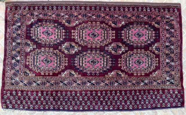 Saryk Chuval, 4.9ft x 2.9ft (148 x 90 cm) late 19 th. century. Majestic Salor Gul design on a dark brown ground.
Interesting elim motifs, which appear to be human shapes. Fine and  ...