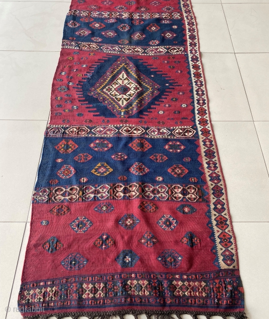 Antique Van - Hakkari Kilim

Single panel / wing kilim with natural and vegetable dyes by Hartushi (Ertushi) Tribe weavers. Woven on horizontal loom. Circa 1900s. Size: 95x242 cm. Condition is great, it  ...