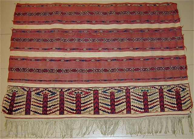 Rare Gossamer Quality Cloth-like finely woven early 19th. Cent. Tekke Striped Chuval with alternating pile and flat-woven areas.
Pile consisting of red and light and dark blue wool, white cotton, and yellow and  ...