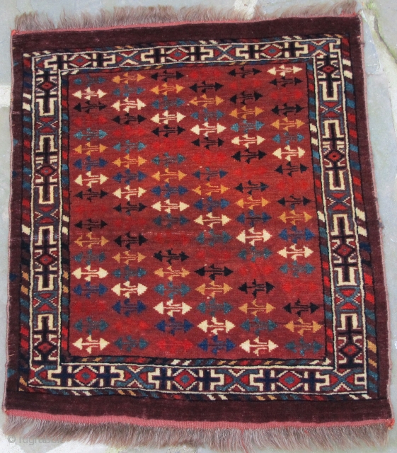 Rare and important fragmentary finely woven Yomud Okbosh with full pile and jewel-like copious silk highlights, circa 1800, 21'' X 19''(53 X 44cm)          