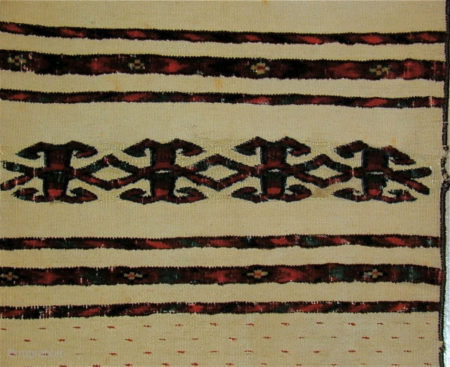 End panel of an all pile Eagle Group tent-band,
(I had owned most of the tent-band many years ago.)
18th. century, 12'' x 48''(tassels inclusive).
Click on detail to see complete fragment.    