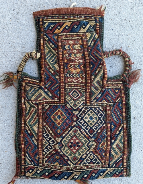 A Dynamic Antique Kurdish Soumak Saltbag Circa 1900 from N.E Persia, beautiful range of natural dyes with original back and handles, in excellent condition, size 1'5" by 1'8"     