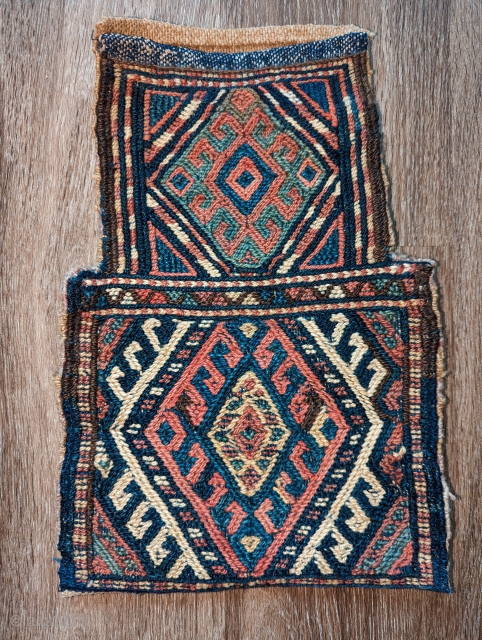 A Dynamic Antique small kurdish Saltbag, circa 1920,a wonderful range of colors with an original back, in excellent condition, size 9" by 1'2"          