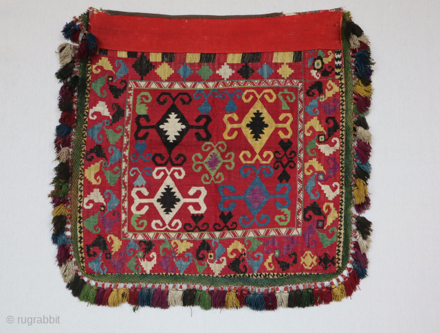 An exceptional antique needlepoint Embroidered textile made by the famous Lakai tribe of Uzbekistan circa the late 19th Century named Aina Khalita(wedding mirror bag)
It has a spectacular red-colored background making this truly  ...