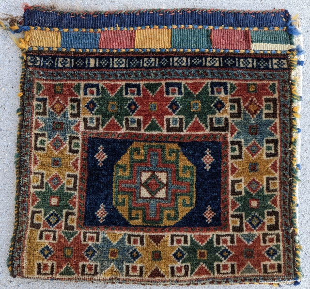 A beautiful Qashqai chanteh with Star design,with complete cotton back,highly unusual,size 1'4" × 1'5",great condition.                  