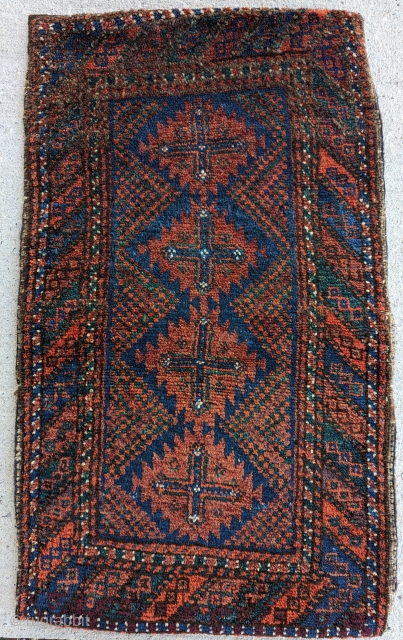 A beautiful Antique Sistan baluch Balist or poshti(cusion)full pile excellent  condition,late 19th century wonderful range of colors blues,greens with original back camel color size 2'5" × 1'6"     