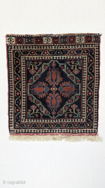 A charming Afshar bag face with a unique tulip design, all-natural dyes circa 1910 or before. It's a finely woven piece and in good condition for its age. You can contact us  ...