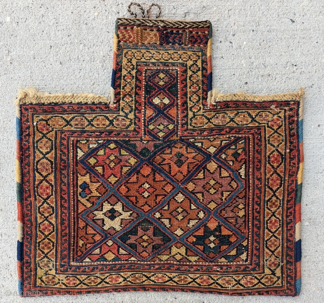 A finely  Woven Afshar Saltbag,great use of colors with a wonderful star design.excellent condition size 1'8" ×1'9".               