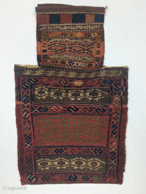 A Dynamic Baluch saltbag, made in the mix technique weave, from late 19th century, with all natural dyes. The henna red dye is high unusual for Baluch of this era and the  ...