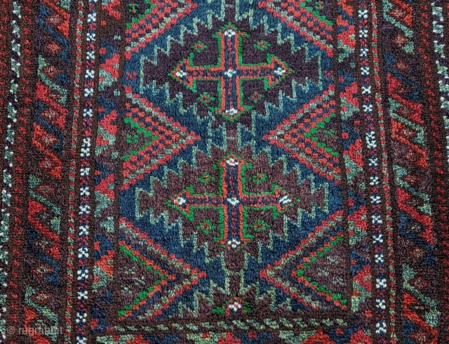 Detail of a Dynamic Sistan Baluch Balist(cushion), a wonderful range of different greens, blues, and other natural dyes, with a soft floppy handle, size 1'9" by 3'2"

      