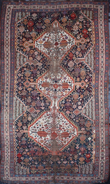 Antique Qashqai Rug


	
Category: 	Antique
Origin: 	Persian 
City/Village: 	Qashqai
Size cm: 	135 x 270
Size ft: 	4'6'' x 9'0''
Code No: 	R2842
Availability: 	In Stock


This rug is over hundred years old and some minor damage    