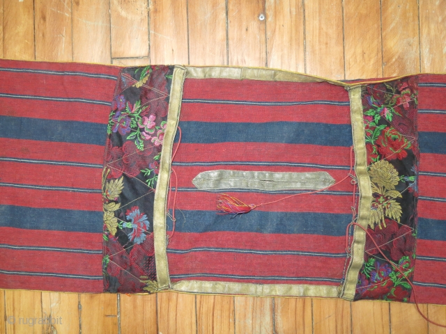 Antique Jajim textile.  Measures 1'1''x3'1''.  Told it was made with silk.  Some staining on back.               