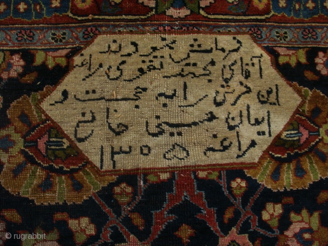 A very boldly executed Sultanabad/Arak area "vase design" carpet with a very legible inscription cartouche and dated 1305 Hijri = 1878 A.D. Approximately 9'6" X 10" with mostly medium to low pile  ...