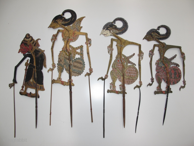 Four antique Indonesian shadow puppets, Circa 1900? Size: 70 cm. (27.5 inch) long.                    