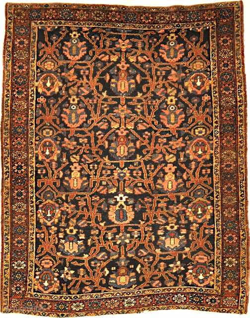 Antique Heriz Rug with a Unique Field
4'9" x 6'2"                        