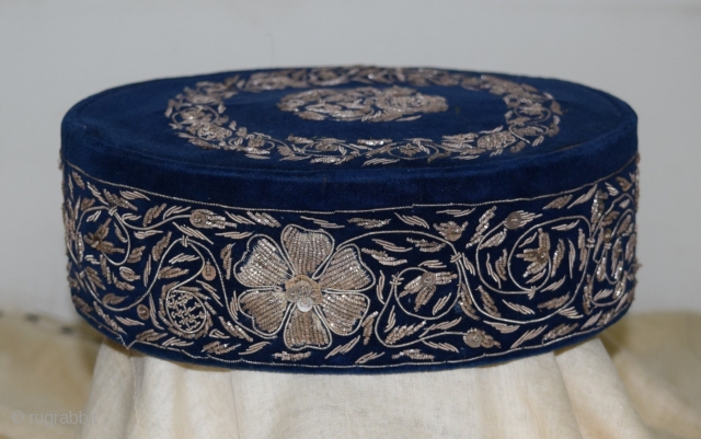 A very fine cap or Topi for men. Silver threat work from Rajasthan on velvet. Size: 19 cms X 14,5 cms. 1920s. SOLD.          