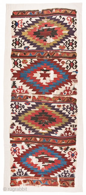 Karapinar Kilim, woven in a long and narrow format without borders, this white-ground kilim belongs to a renowned group that is well-documented in literature. The white field is divided into four horizontal  ...