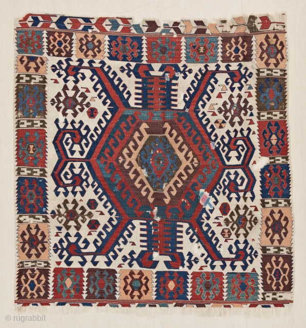 Hotamis Kilim, this impressive white-ground kilim fragment ? is a weaving by the Hotamis Turkmen of the Konya region. The powerful motif appears to have been a specific tribal design of the  ...