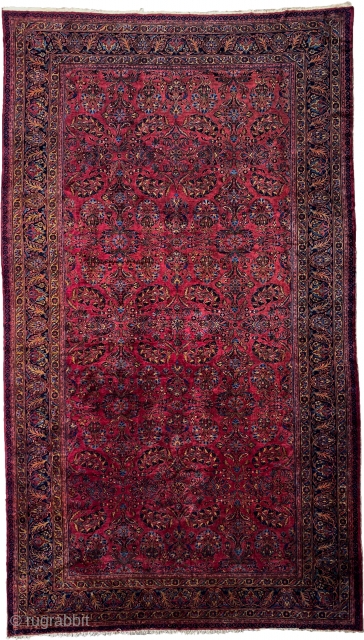 It is rare to find Lilihan carpets in such a big size. The deep red ground is decorated with an all-over bush design and a floral dark blue border. The colours are  ...