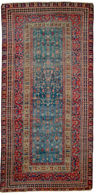 This is a most unusual 19th-century Farahan rug, 290x140cm, with a Turkish design. As shown in the image, there is a repair, and the selvedges are rebound. It is evenly worn, which  ...