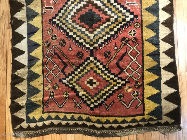 Gabbeh  type longish rug. Some zig zags. As found, sporadic repairs.                     