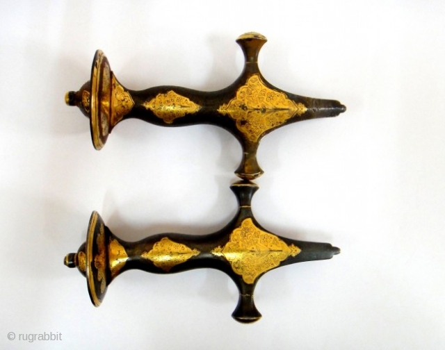 A PAIR OF MUGHAL SWORD GOLD INLAID HILT , 18TH CENTURY                      