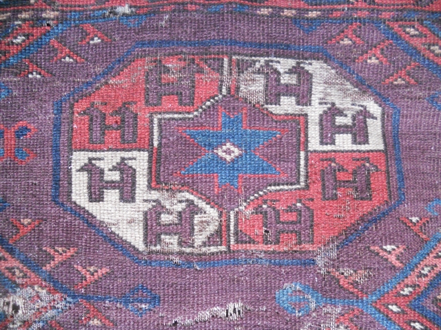 Rar Early main carpet fragment 1800. with Tauk Nuska Gul/Curled Leaf Border the Ground is imperial purple Please enquire for more Information 
Kind regards         