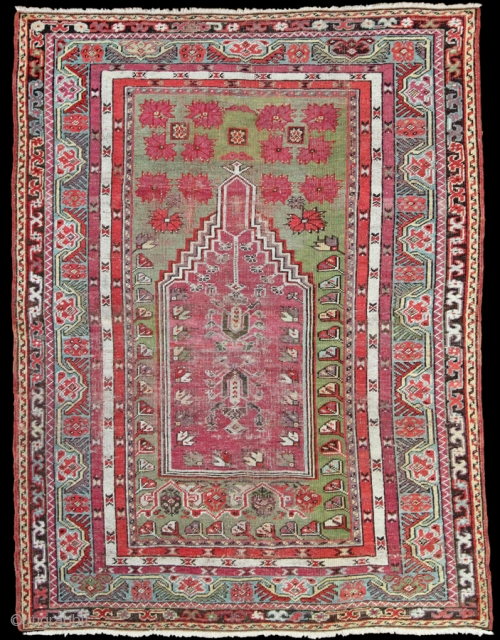 Anatolian Kirshehir Prayer rug with great colours! The green dyes are fantastic! Original ends and selvedges. Mid 19th Century, some old restoration to the main field.  5' 6 x 3' 11ft  ...