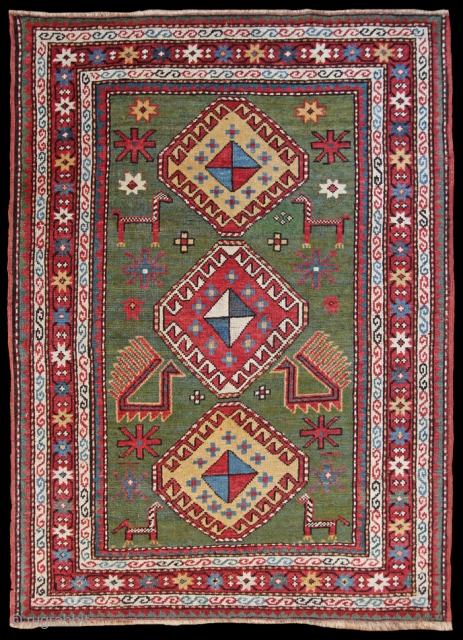 Antique Kazak rug, Caucasus, Late 19th Century 4'4 x 3'1 ft. 1.32 x .94m  In good condition and rare in this green colour! SOLD        