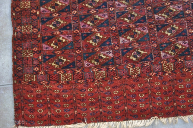 Antique Tekke Aina Gol Chuval / 1.07m. x .72m.
Circa mid 19th c.
Good condition, partial original selvedge, no restoration, just securing of the sides. Extensive use of deeply corroded  magenta silk .  ...