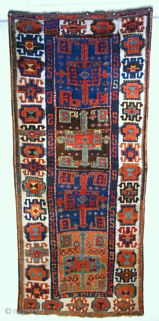 Archaic East Anatolian Yuruk Rug. circa 1800 - 1830. Size 7'4" x 3'1"
Condition is excellent with mostly full pile. One narrow border at one end is restored. Brilliant color and wool, in  ...