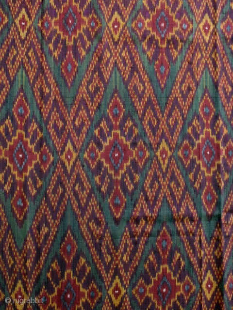 Fine, older silk skirtcloth from Cambodia; beautiful colors and crisp ikat; condition very good.                   