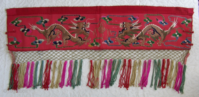 M113 Mongolian Altar cloth.   I acquired this textile in my early travels through China. Utilizing all couching embroidery technique on red wool fabric, it depicts 2 golden dragons chasing the  ...