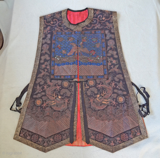 Qing Dynasty civil court vest....has front badge only and badge has minor thread loss at lower corner...
Gold thread embroidery, dragons etc....really good condition
Location Atlanta Ga.

additional items on Trocadero.com/ethnic     