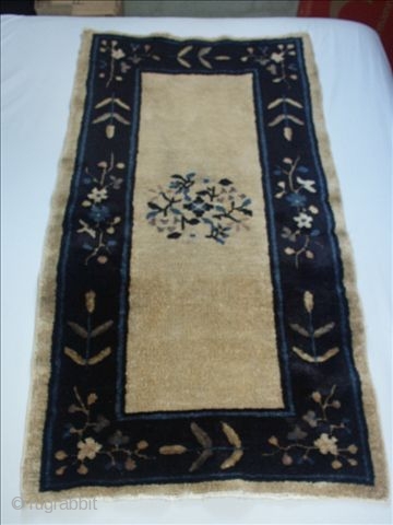    Antique Chinese small Rug , Peking 19 th. ca. 62 X 114 cm.
   
   Superb lustrous pile , slight wear in the field . All  ...