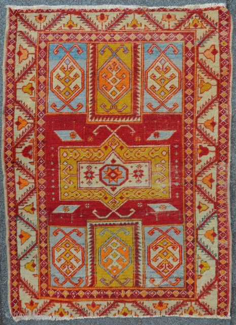 Small west Anatolian rug with allover thin floor, 121 x 87 cm                     