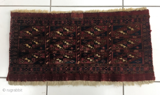 Antique Tekke Mafrash. 35 cm x 65 cm. Some small patched repair (see top edge). Nice piece with some silk.             