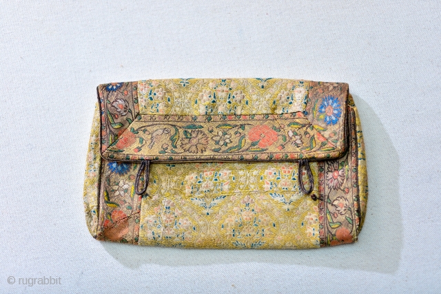 1600s / 17th Century Safavid silk / gold brocade.

This antique purse was custom made out of 17th Century Safavid textiles. The purse was crafted in the early 20th Century in either London  ...