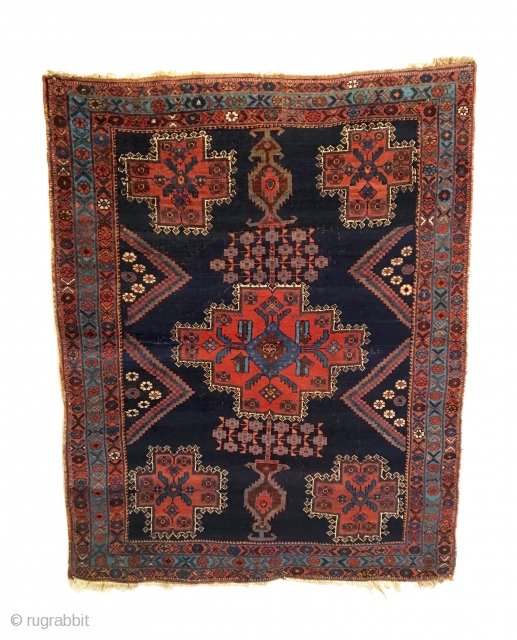 Antique Afshar Rug. Late 19th Century. Stylized multi-colored vases rest on top and bottom with central striking medallion. Truly a tribal piece. All original in very good condition. Remnants of kilim ends  ...